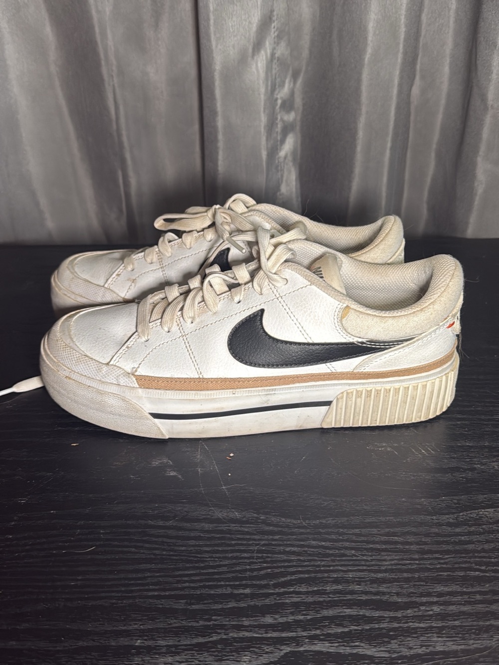 Nike Kids White Sneakers with Black Swoosh and Tan Accent